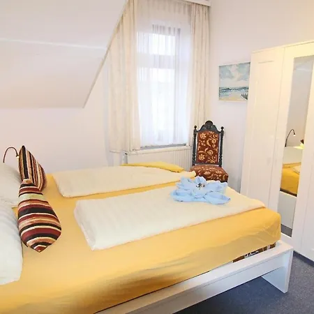 Kapitaenshaus-lassen-zimmer-odysseus Pensjonat Westerland
